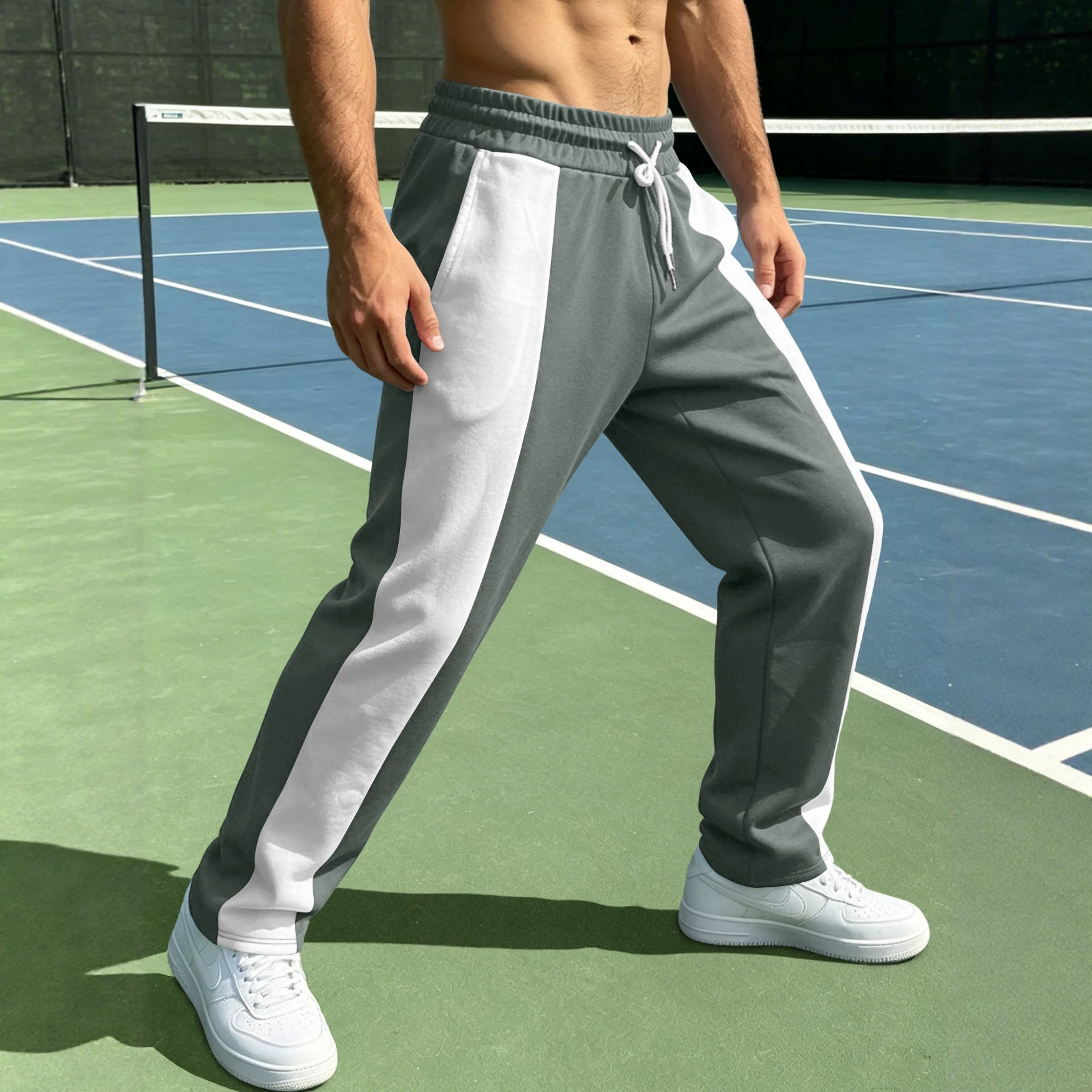Estación independiente transfronteriza hombre americano deportivo casual relajado tela saludable cintura para correr rápido secado empalme pantalones de color contrastante