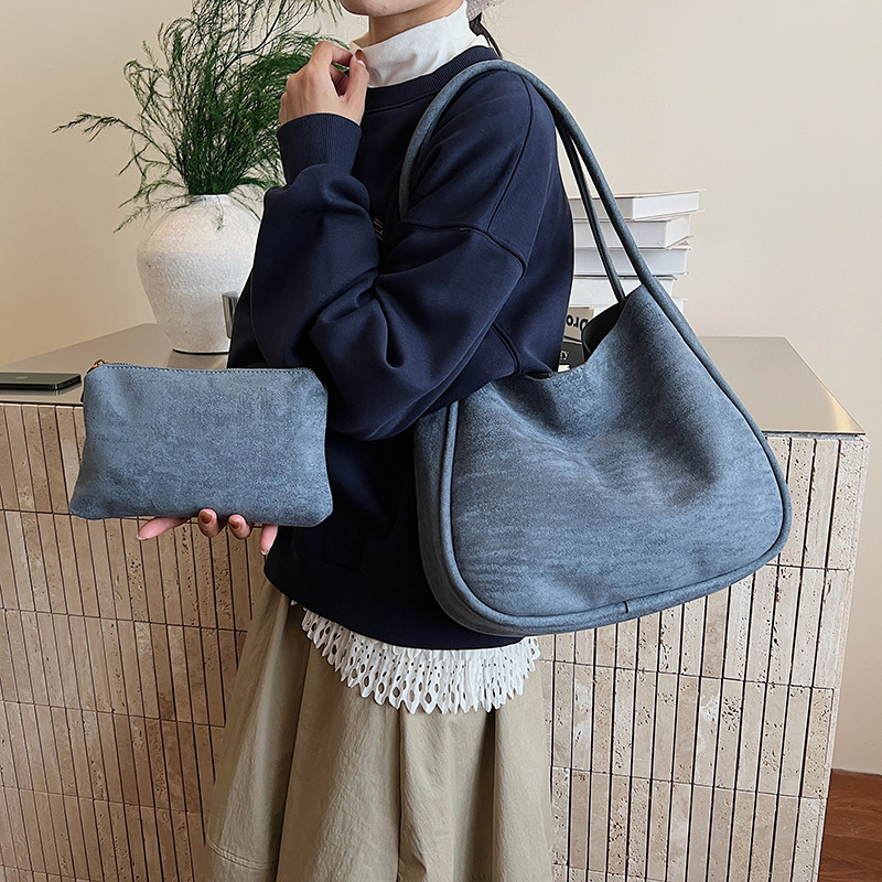 Transfronterizo 2025 otoño y invierno nuevo retro cubo de cuero de seda bolsas de mano para mujeres bolsas de braza simple y versátil bolsas de hombro de viaje