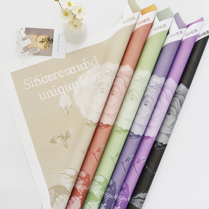 Huaxi Rose Story Papel de embalaje Ramo Papel de embalaje Impermeable Material de papel de embalaje Material de floristería Ramo de flores Papel de embalaje