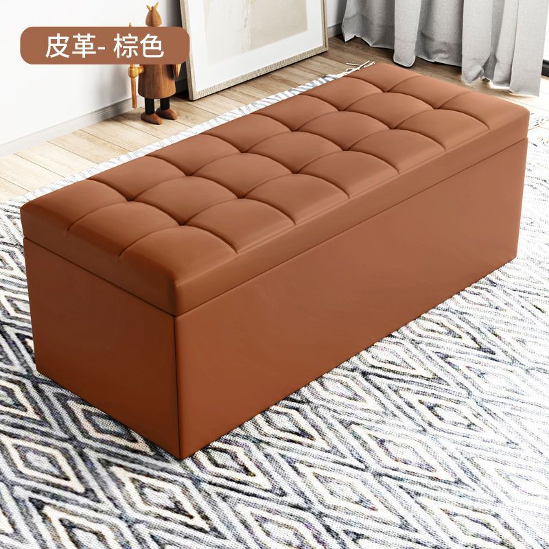 洋服屋の試着室の長いソファーの腰掛けの収納棚の長方形の靴の腰掛けの家の入り口は大人に座ることができます。|undefined