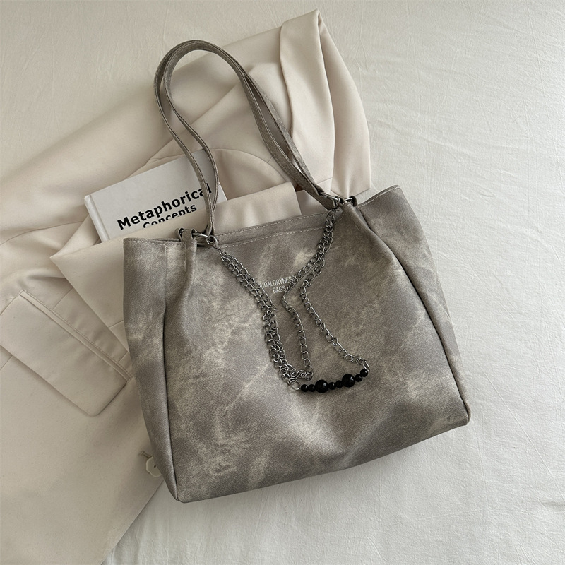 Bolsa de hombro retro de gran capacidad para viajar a la cadena de trabajo para mujeres 2024 primavera y verano nicho bolsas de brazo bolsas de moda