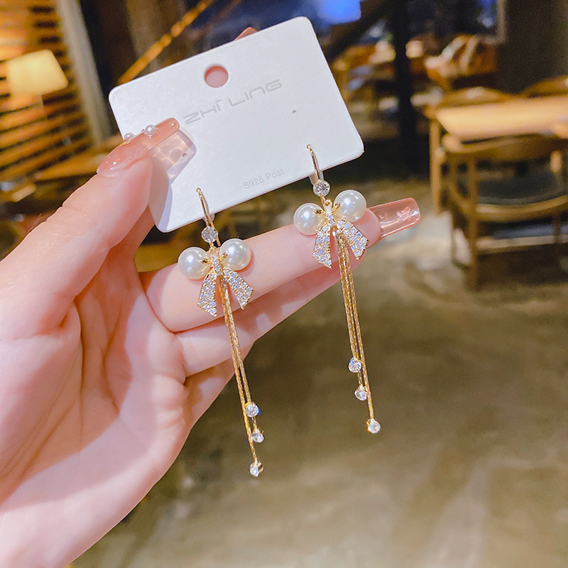 South Korean earrings with bow pearl with zircon