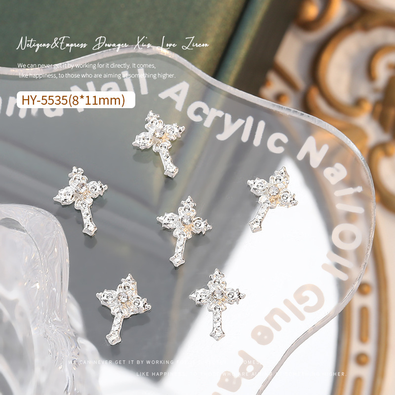 Nueva celebridad en línea flash tridimensional Cruz joyería de uñas de ganchillo taladro de uñas Super Flash aleación decoraciones de uñas