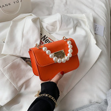 女式包包2021春季新款珍珠手提迷你口红包小果冻包时尚休闲零钱小