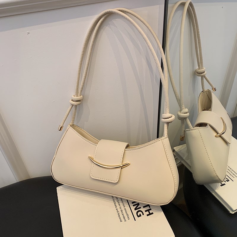 Bolso de axila de un solo hombro de estilo popular de nicho de alta gama para mujer 2025 primavera y verano nuevo bolso bandolera salvaje de moda