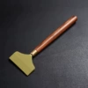 Tea scraper