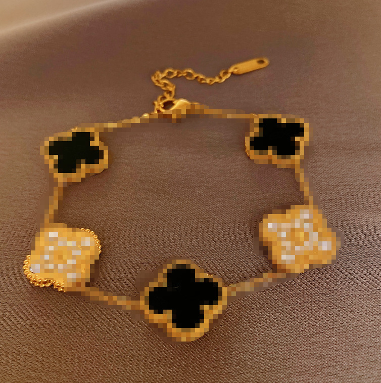 Pulsera de acrílico de cuatro hojas de diamantes de acero de titanio negro de dos lados