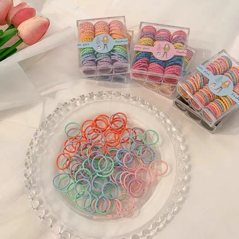Banda de goma cuerda de pelo de las niñas elásticas altas 90 piezas Estilo coreano lindo color caramelo en caja tamaño pequeño