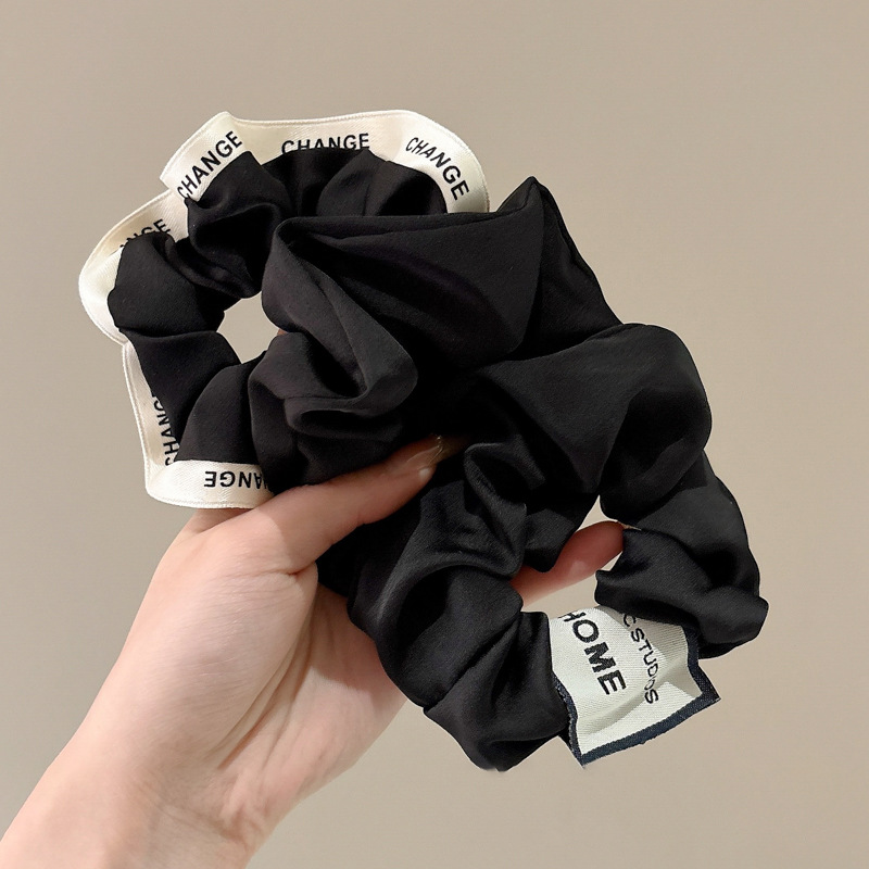 Nuevo estilo negro intestino grueso lazo para el cabello femenino Cuerda para el cabello de temperamento de alta calidad Cuerda para la cabeza Apuntar de flor en la cabeza Banda de goma Accesorios para el cabello de verano Tombros