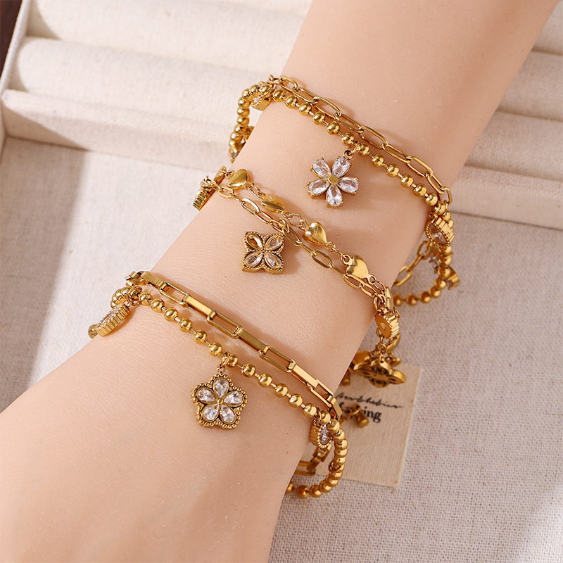 Tina Europa y los Estados Unidos transfronterizos inswind exquisita mariposa flor diseño de modelado pulsera de zircon ligera lujosa nicho joyería de mano mujer