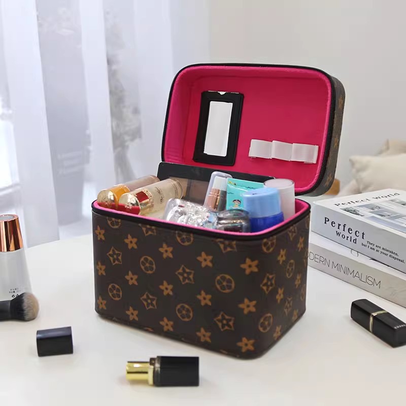 Bolsas de maquillaje europeas y estadounidenses transfronterizas de gran capacidad de alta calidad caja de maquillaje portátil de tres piezas conjuntos de exportación de caja de almacenamiento de cosméticos en línea