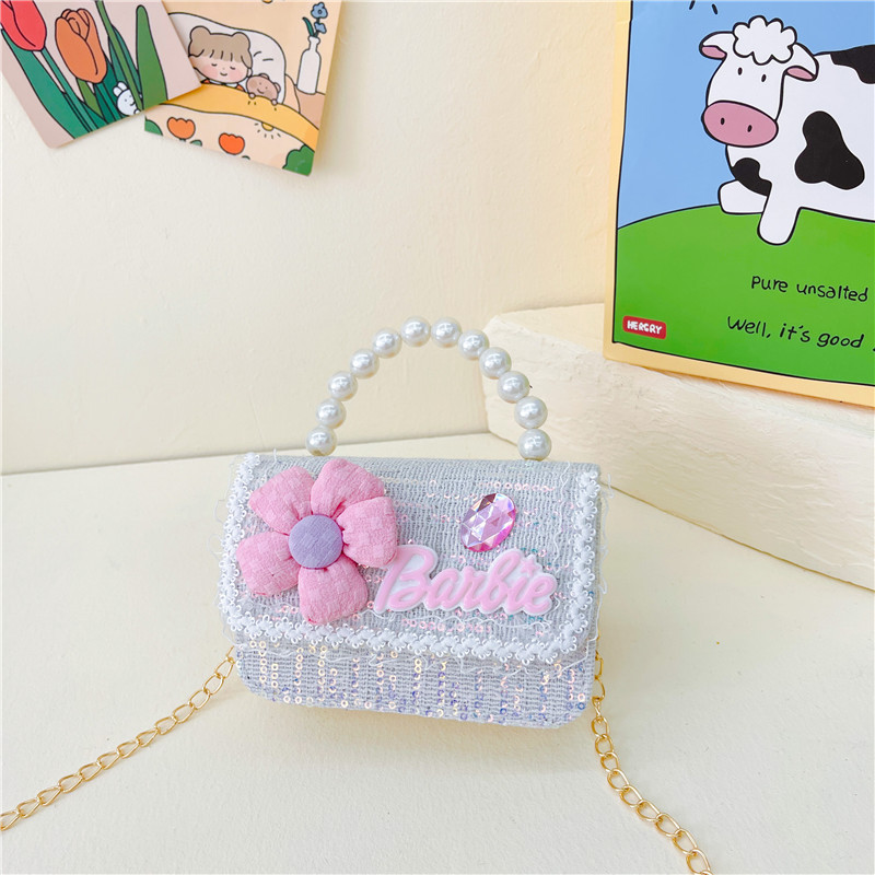 Bolso de los nuevos niños al por mayor bolso de princesa Linda pequeña flor arco accesorios bolsa versátil bolsa de mensajero de las muchachas