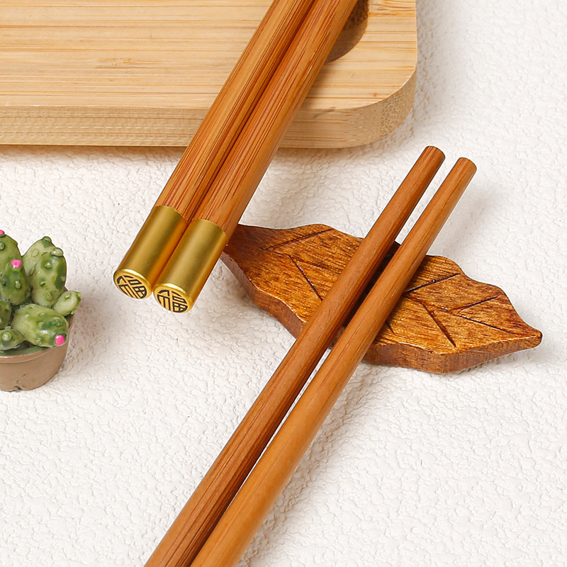 Palillos de madera maciza domésticos de alto aspecto al por mayor cúpula fu personaje kuaizi puesto antideslizante corriendo Jianghu grupo comunitario suministro de compra