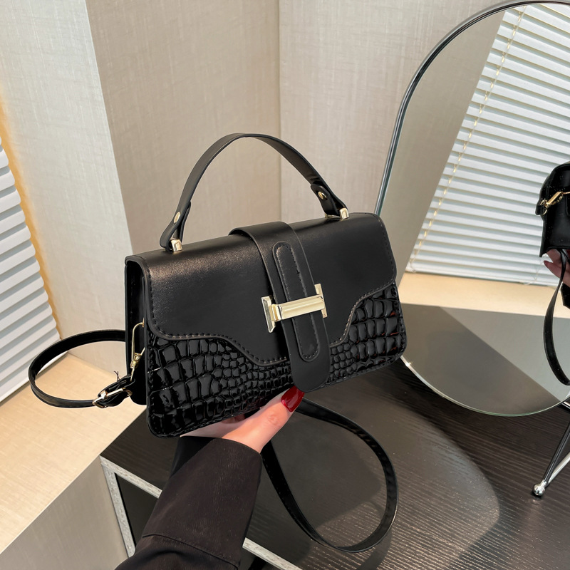 Bolso bandolera de un solo hombro de textura de alta gama de diseño de nicho 2024 otoño e invierno nuevo bolso cuadrado pequeño portátil de todos los partidos