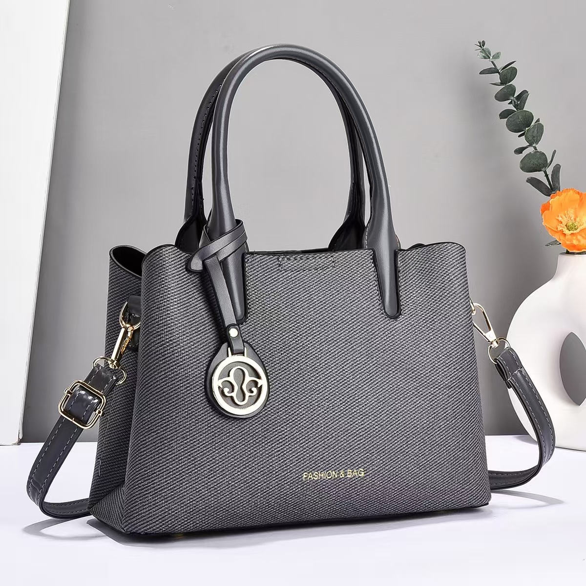 Bolso de mano universal nuevo bolso de hombro de moda bolso de mediana edad bolso de madre bolso de transporte casual bolso de mano