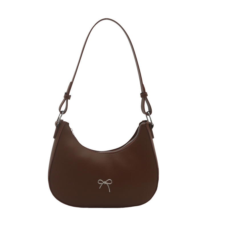 Bolso de axila con lazo para mujer 2024 nuevo estilo literario minimal bolso de hombro textura de viaje de moda de luna nueva marea