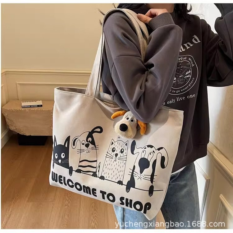 Casual Large Capacity Canvas Bag Women's 2025 New Lightweight All-match Commuter Shoulder Bag Graffiti Portable Tote Bag