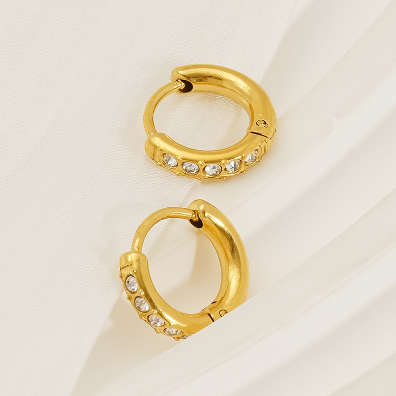 Pendientes de acero de titanio de estilo europeo y americano de oro de 18 quilates para niñas, lujo ligero de alta calidad, botones de oreja que no se desvanece, pendientes de acero inoxidable para mujeres