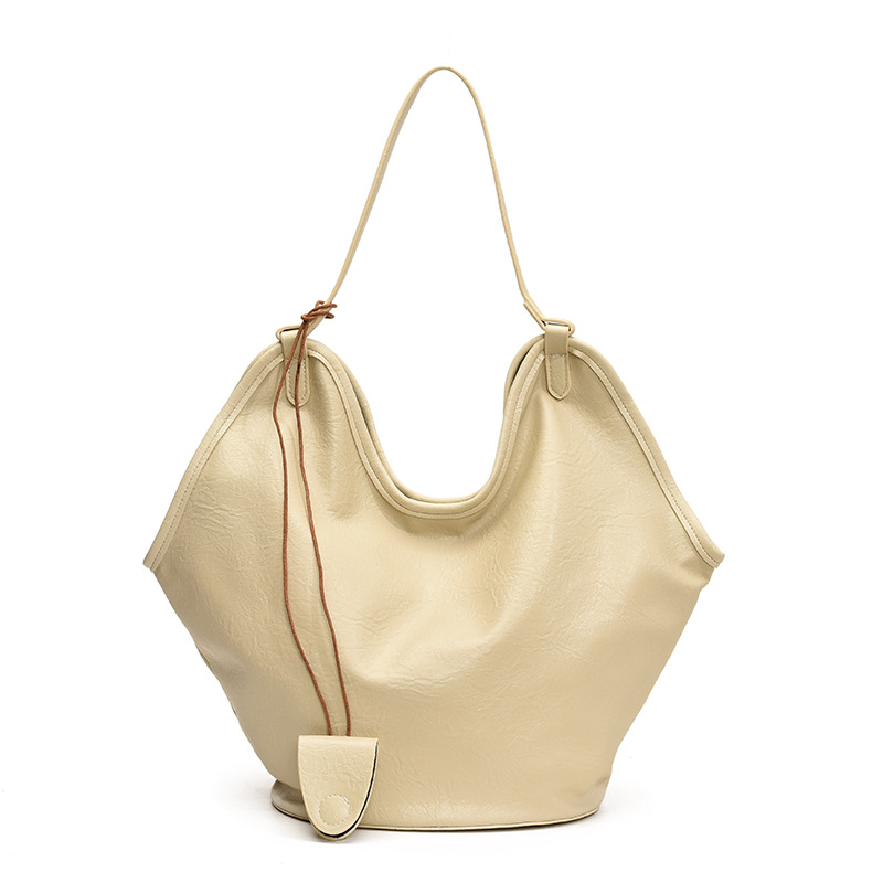 Bolsa de cubo transfronteriza de gran capacidad, bolsa de viaje retro de mujer 2025, otoño y invierno, nueva moda, bolsa de brazo, bolsa de hombro universal