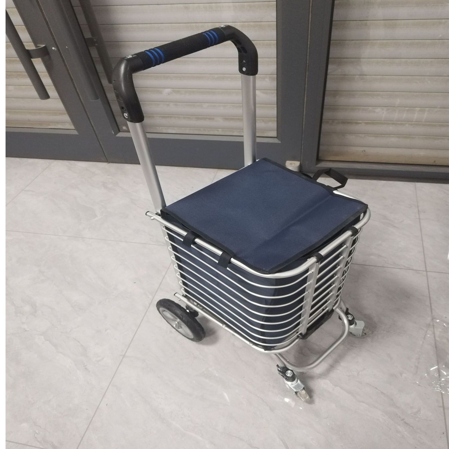 Subir escaleras para comprar verduras, pequeño conductor tirado por mano, carro plegable, portátil multifuncional, anciano, agua embalada para comprar verduras, artefacto mágico, joven