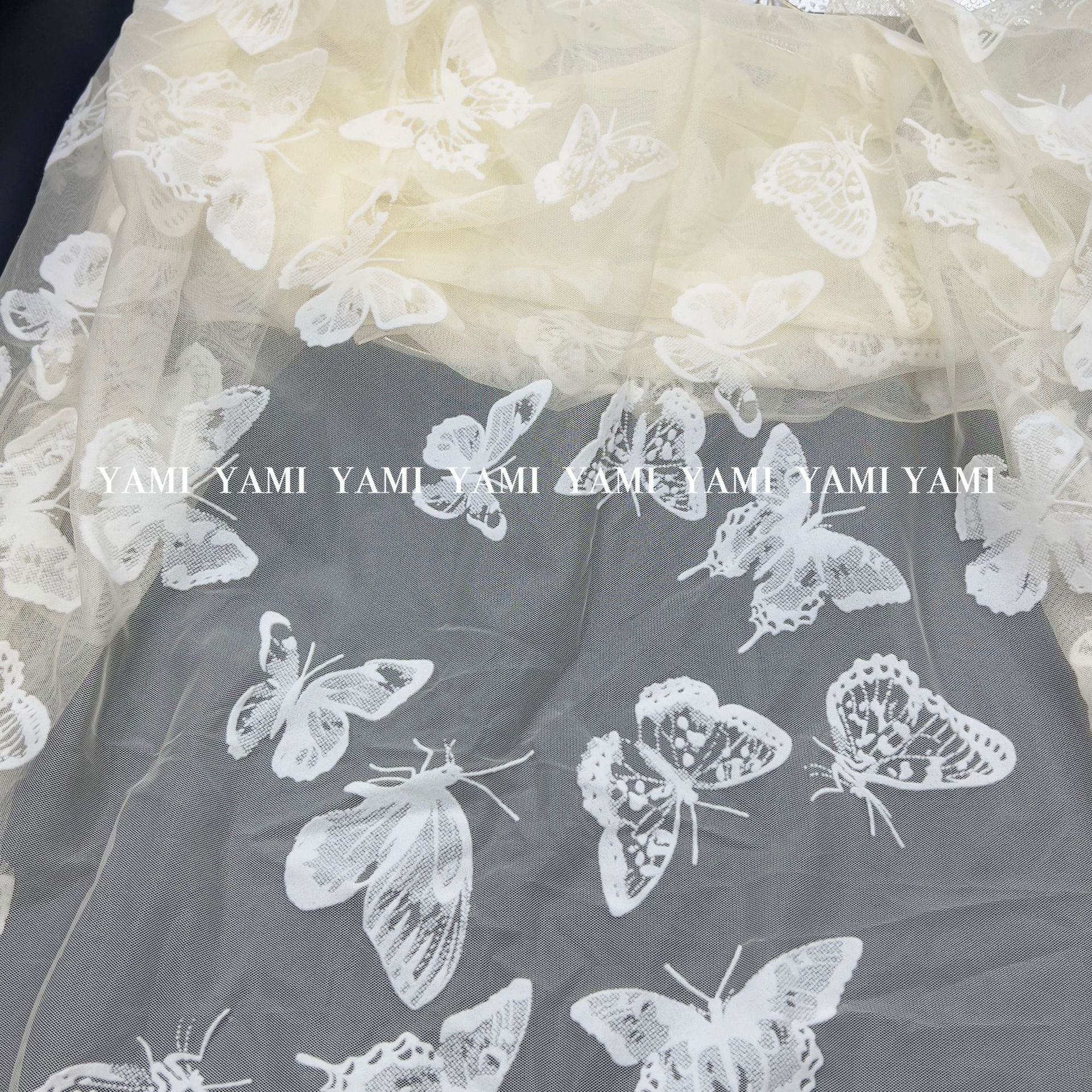 Tejido de malla de mariposa flocado mariposa hueca flocado tela de encaje de malla ultraflexible ropa infantil vestido de princesa tela de ropa china