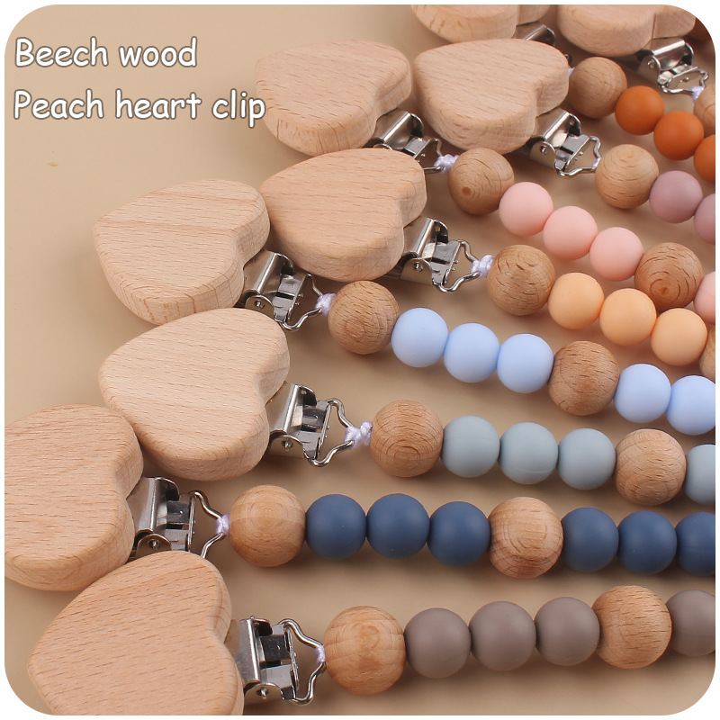 Nuevo bebé herramientas de haya melocotón corazón chupete clip Cadena de chupete cadena creativa bebé cuentas de silicona anti-gota cadena