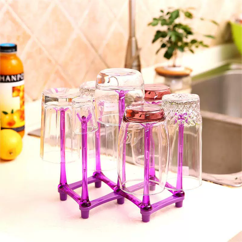 Folding drying rack, storage system, glass holder with glass