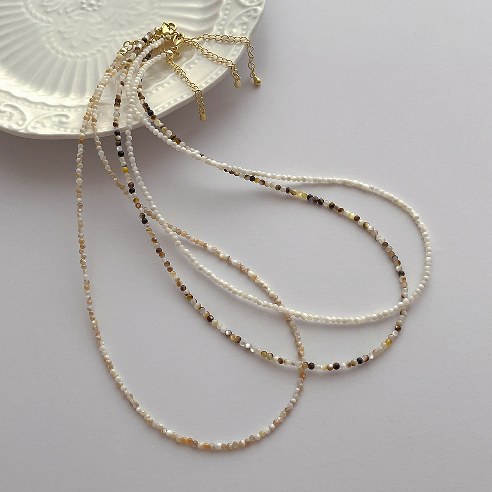 Small design organic universal necklace from pearl