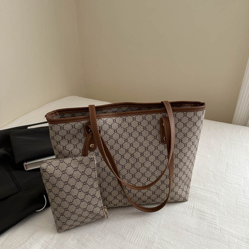 Bolso de alta calidad de gran capacidad 2025 nuevo bolso de viaje de todo fósforo de nicho para mujer bolso de niño de moda para mujer bolso portátil para mujer