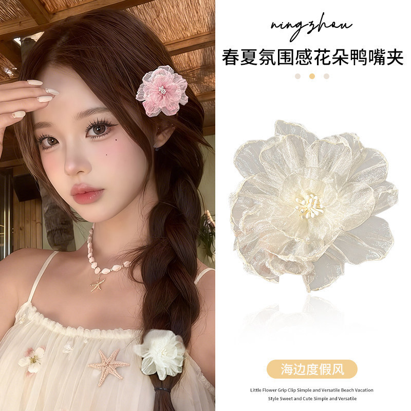 2#Clip para flequillo lateral con flor blanca