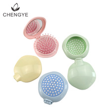 定制彩色花瓣圆镜梳儿童梳发梳批发迷你口袋梳旅行气垫按摩折叠梳