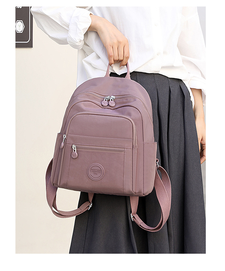 Colorful Fox's new women's backpack, large-capacity multi-layer water-resistant student schoolbag, and simple handbag undefined