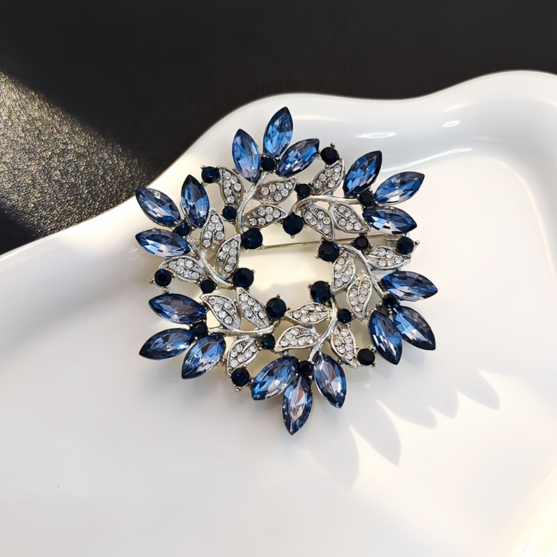 Europese en Amerikaanse lichte luxe vintage bloemenbroche voor dames, hoogwaardige, verfijnde blauwe kristallen broche met unieke details_voghion.com