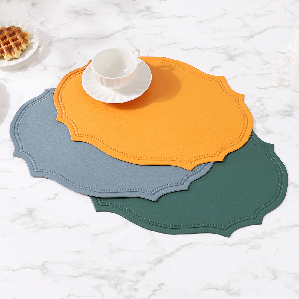 Ventas transfronterizas calientes europeas ins ins ins de cuero en relieve esterilla aislante de escritorio de alta calidad esterilla aislante de tazas resistentes al quemado esterilla de PVC