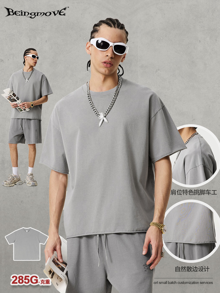 2025 verano Europa y América alta calle interior de alta sensación de alto nivel de estilo neutral rizado de manga corta adolescente camiseta de cuello redondo camiseta publicitaria hombre