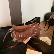 可爱复古猫咪法棍包小众设计通勤女包百搭韩版ins手提斜挎包包