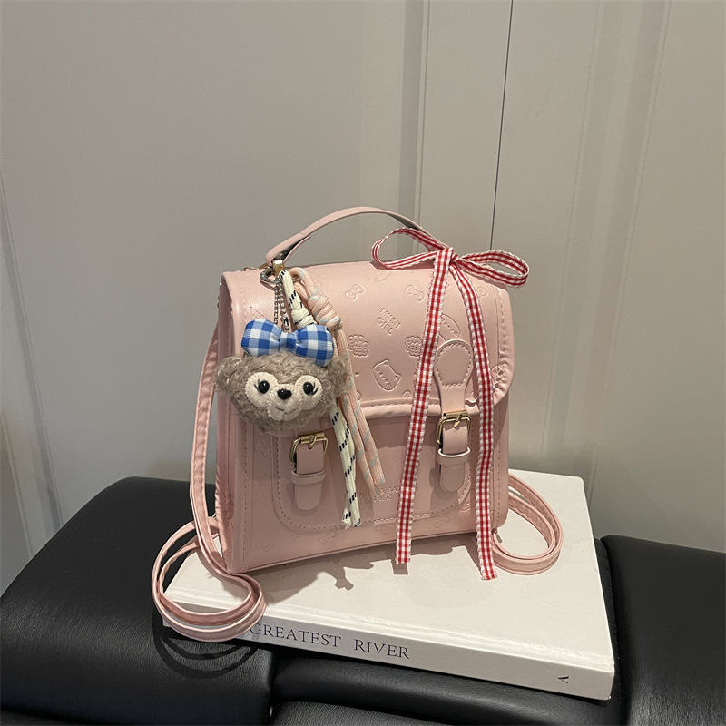 Mochila en relieve 2026 primavera y verano nueva moda mochila de viaje de mano bolso de cubo de hombro