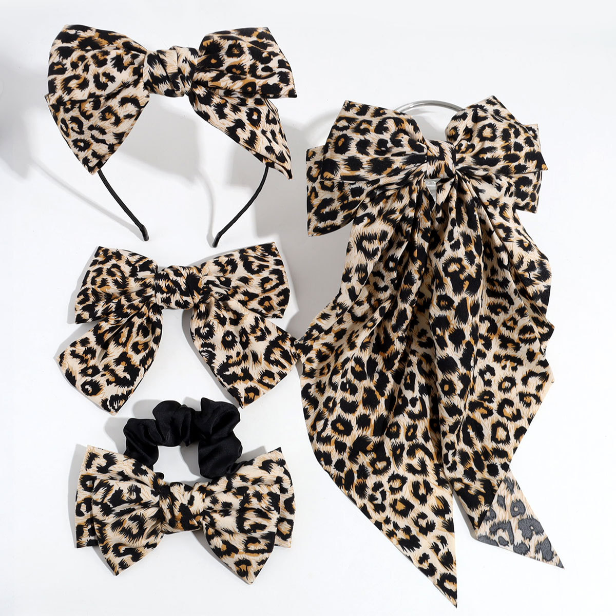 Estilo de moda europeo y americano personalidad nicho de diseño arco leopardo aro de pelo clip de resorte retrógrado anillo para el pelo accesorios para el pelo