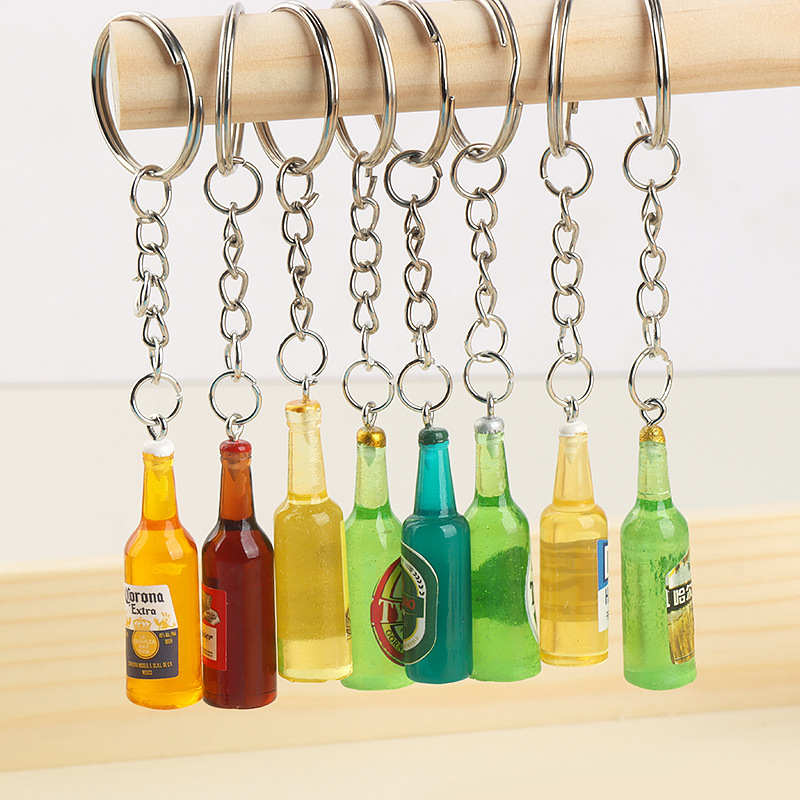 Cerveza botella de vino llavero accesorios de resina bricolaje accesorios de carcasa de teléfono móvil crema epoxi bolso de niña colgante al por mayor