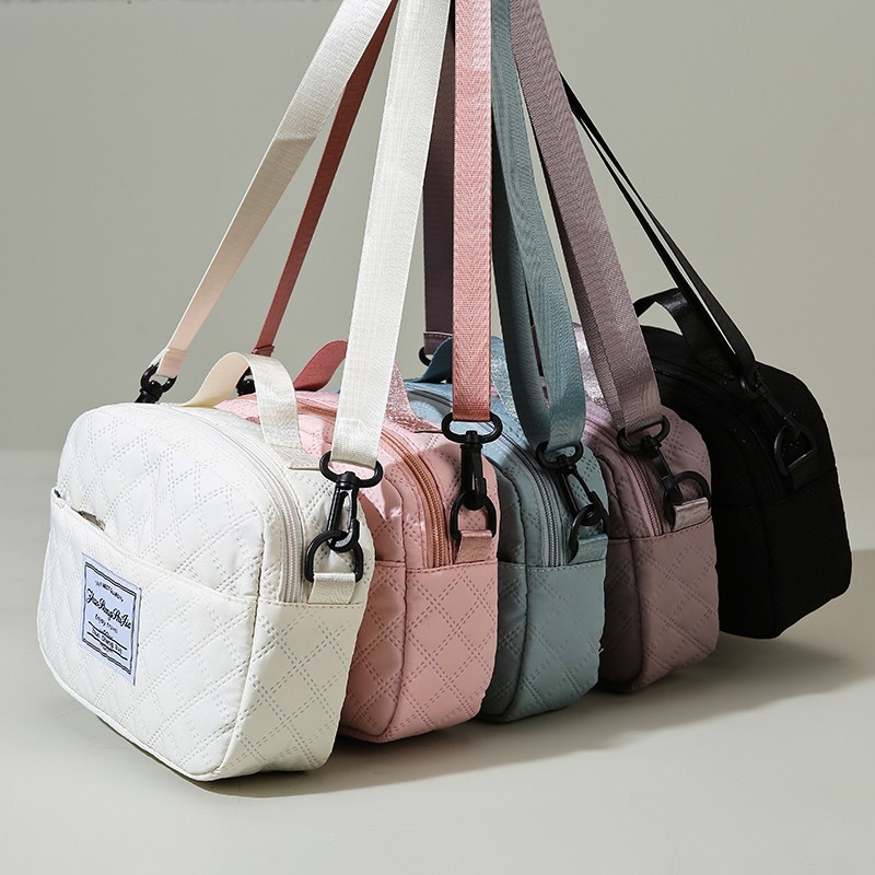 Bolsa de viaje acolchada informal al por mayor, bolsa deportiva y de fitness de gran capacidad, repelente al agua para viajes cortos, bolsa de almacenamiento para maternidad