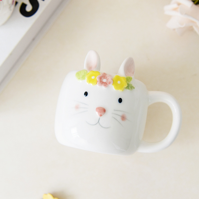 Inventario encantador nórdico conejo taza de agua de cerámica doméstica flores de conejo taza de desayuno de leche de doble cara