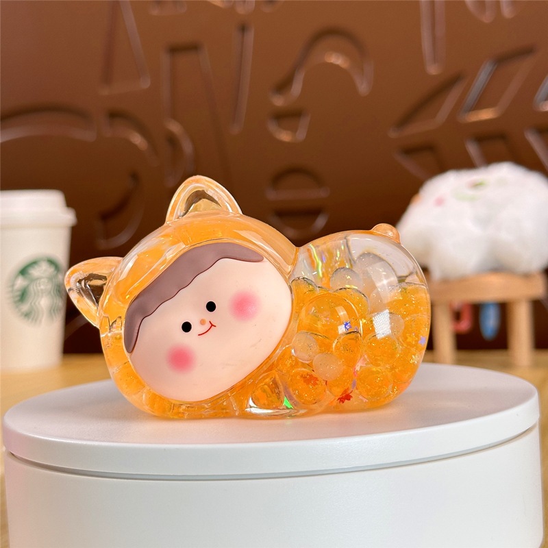 Nocturno explosivo gato macarón super lindo dibujos animados arena flotante en aceite caja ciega pequeña bolsa ciega adornos al por mayor