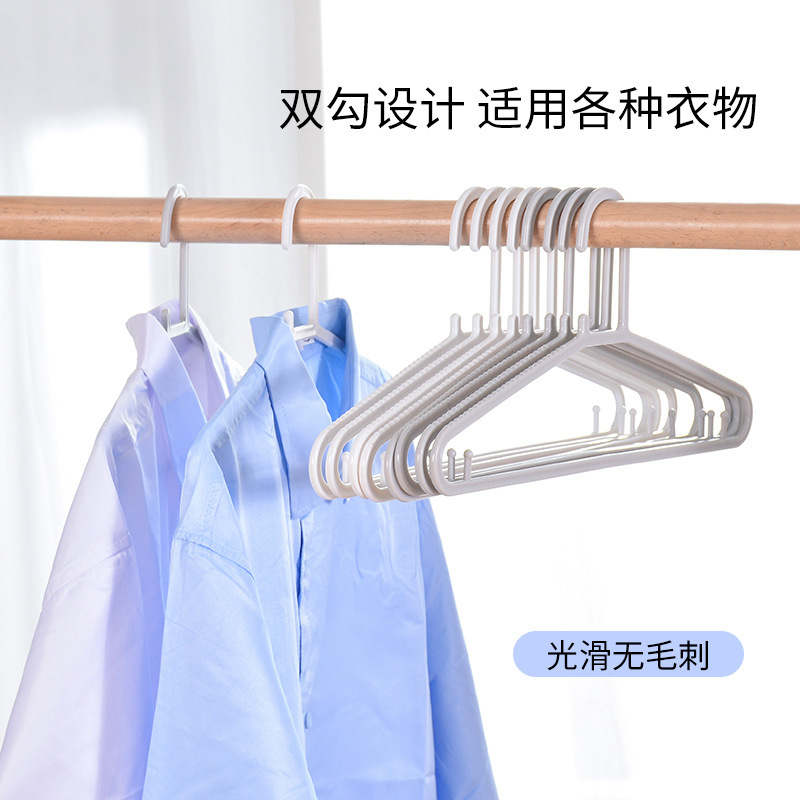 Percha de ropa antideslizante engrosada multifuncional hogar de plástico sin costuras estante de ropa de hombro ancho con soporte de ropa de gancho engrosado ensanchado