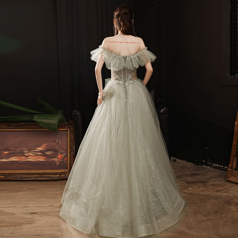 Nuevo vestido de noche elegante y sencillo con hombros descubiertos para el verano 2026, con exquisita artesanía, vestido de hada para reuniones anuales.