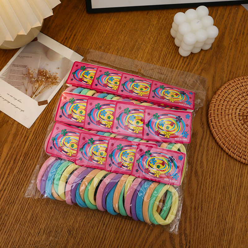 Ventas transfronterizas directas coreanas de alta elasticidad de color sólido no dañan la cuerda de cabello 72 bolsas de tarjeta de clavos sin costuras anillo de toalla anillo de cabello