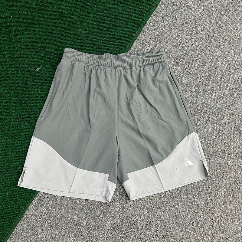 Fabricantes al por mayor de pantalones cortos deportivos para hombres de velocidad de hielo seco maratón de verano delgado entrenamiento de acondicionamiento físico panty