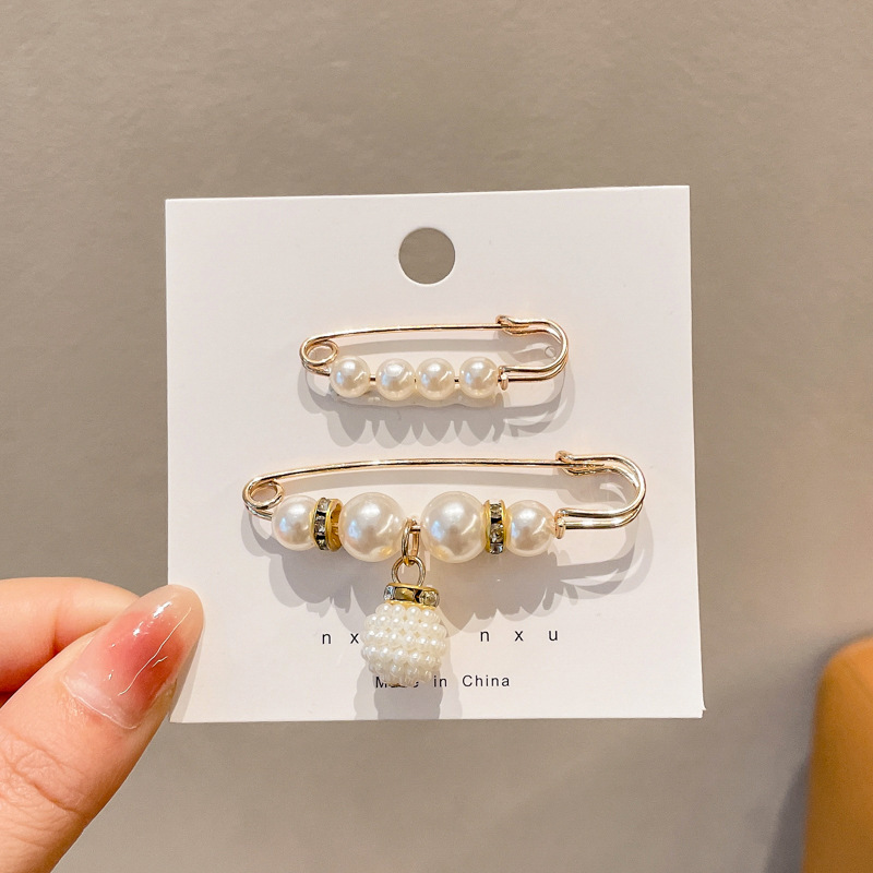 Falda con hebilla de cintura de perlas, circunferencia de cintura grande, cambio de artefacto, hebilla anti-luz, ropa, broche de diseño fijo