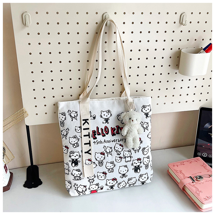 The new fashionable cartoon canvas bag, simple and versatile tote bag, cute commuting single-shoulder tote large bag, is selling well across borders undefined