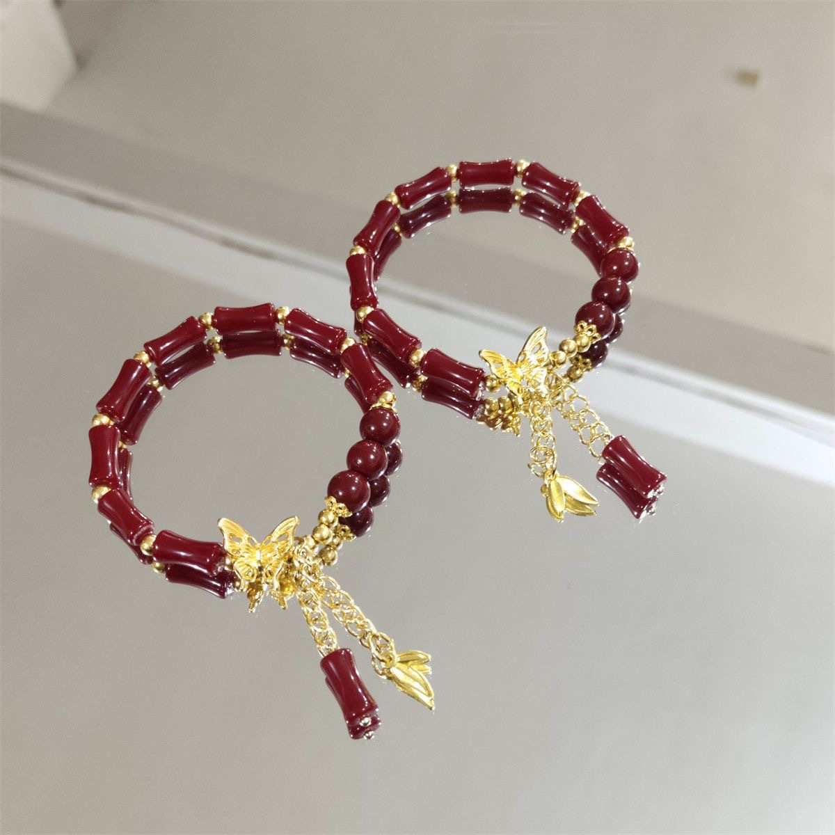 Pulseras de mariposa de oro antiguo estilo chino, nichos de bambú, parejas de madera, estudiantes, colinas de mano, joyas de mano
