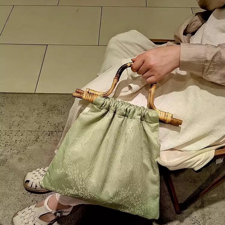 New elegant and high-end Chinese style homemade rattan woven hand-held bamboo knot cheongsam bag_voghion.com